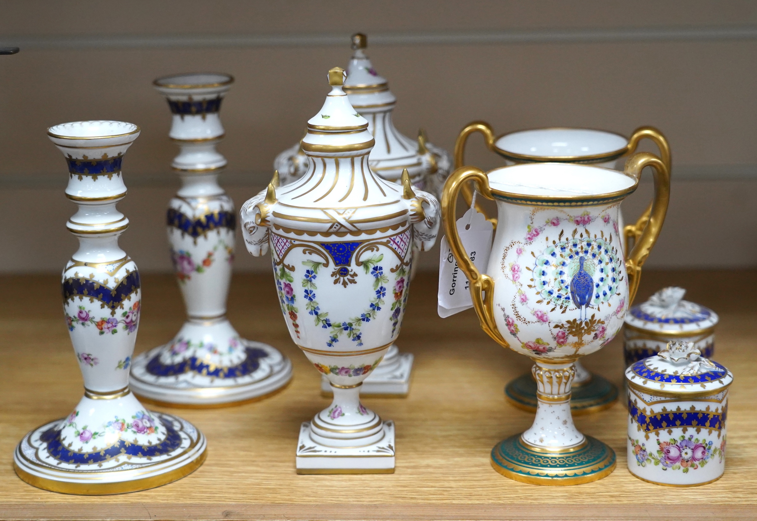 Three pairs of Dresden decorative porcelain items and a pair of Royal Crown Derby ‘Peacock’ urns, tallest 20cm (8)